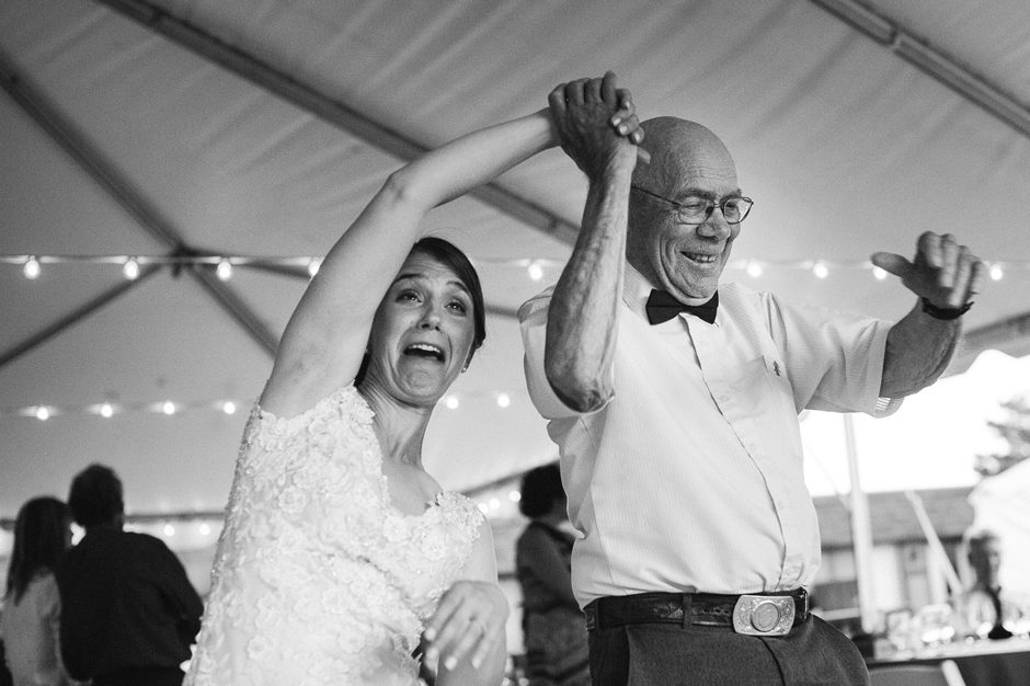 A fun moment with the bride dancing with her grandfather