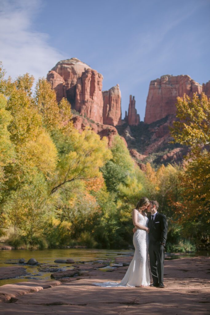 Red Rock Crossing elopement in the fall with yellow leaves.