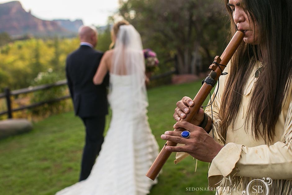 L'Auberge Weddings ~ native American flautist Kel Mockingbird plays incredible music after the ceremony for all to enjoy