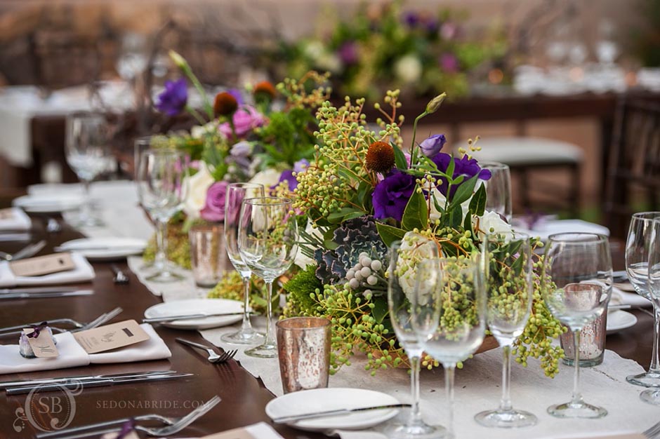 L'Auberge Weddings ~ table floral centerpieces adorn each table for the guests to enjoy