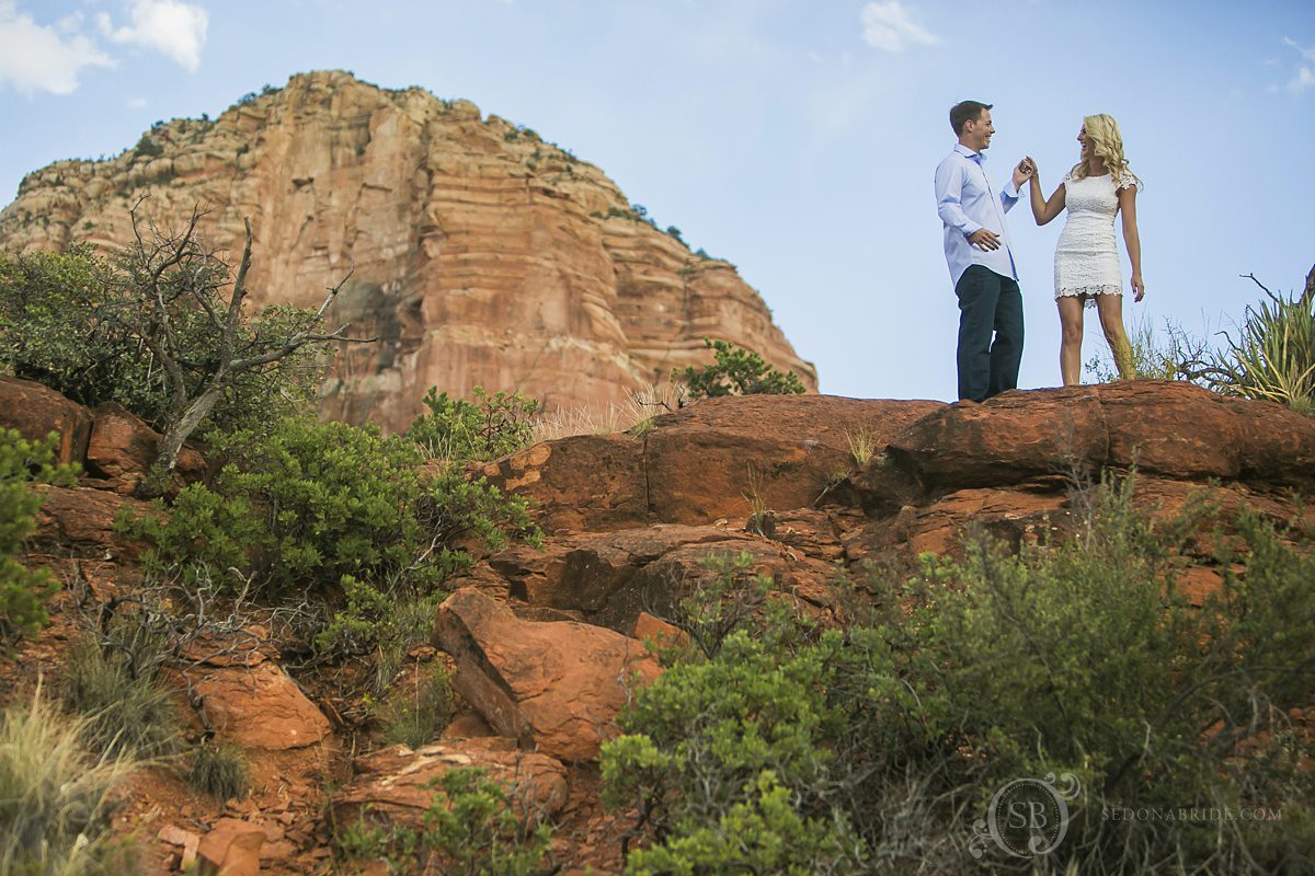 a couple on the red rock mountains