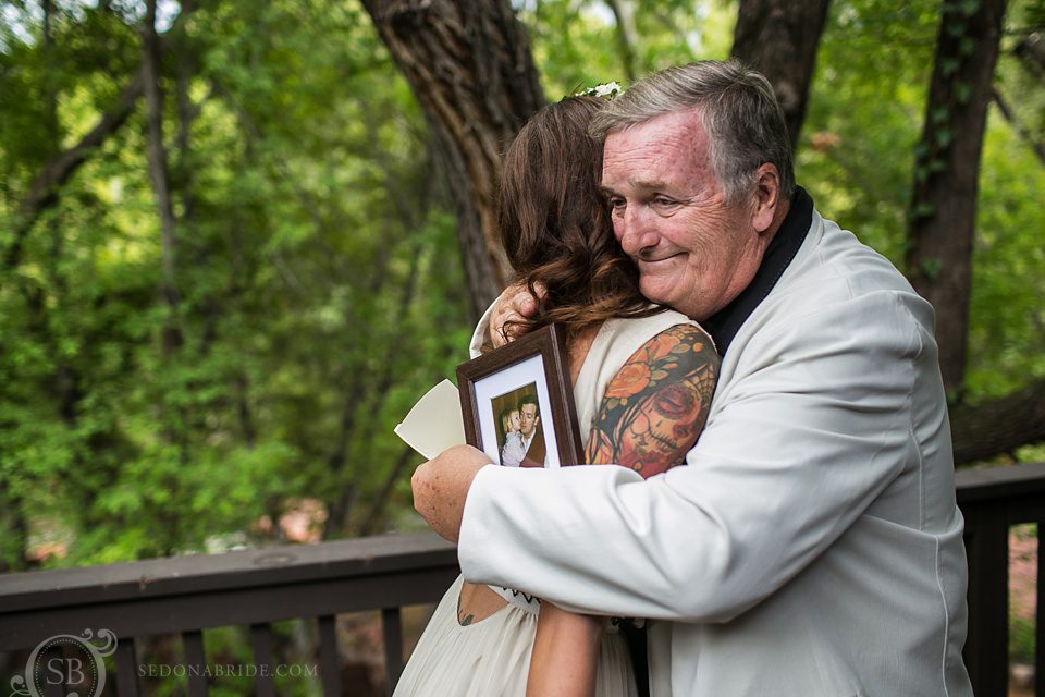 father daughter wedding hug