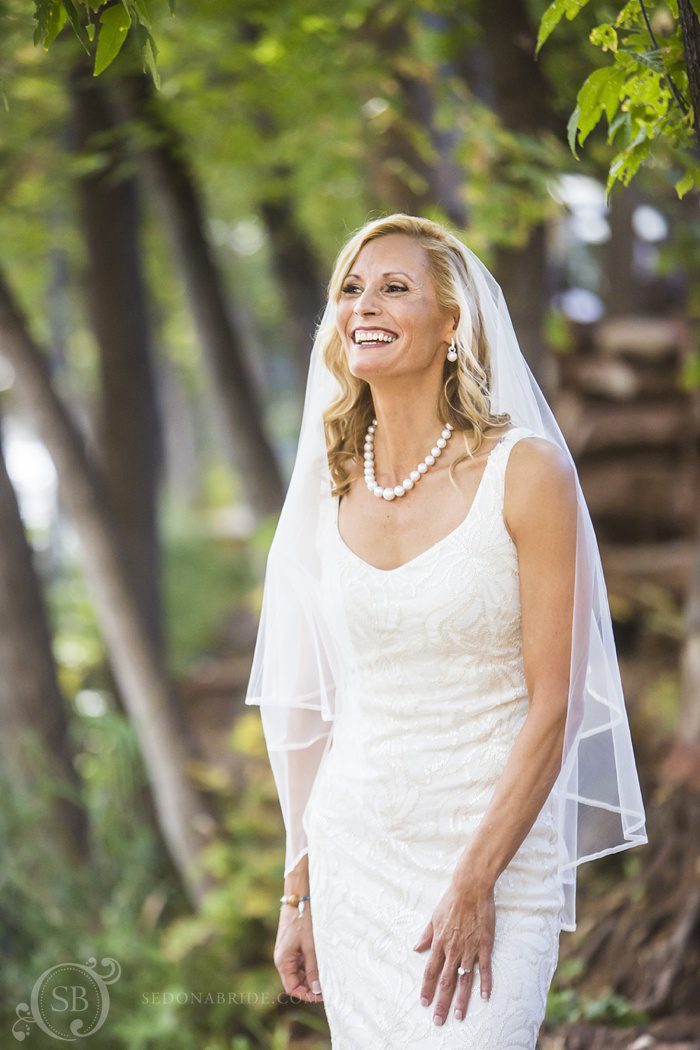 Sedona chapel wedding ~ Anita and Armand's wedding in Sedona - Anita eagerly awaits Armand's arrival