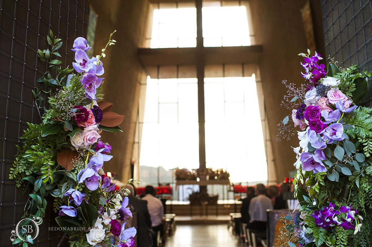 Sedona chapel wedding ~ Anita and Armand's wedding in Sedona - The Chapel of the Holy Cross is so beautiful when adorned with wedding flowers!