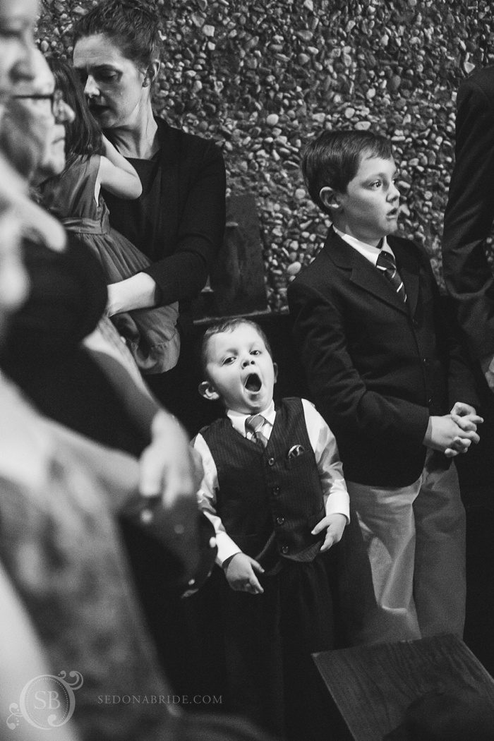 Sedona chapel wedding ~ Anita and Armand's wedding in Sedona - A yawn overcomes this little one as he watches the Sedona wedding ceremony.