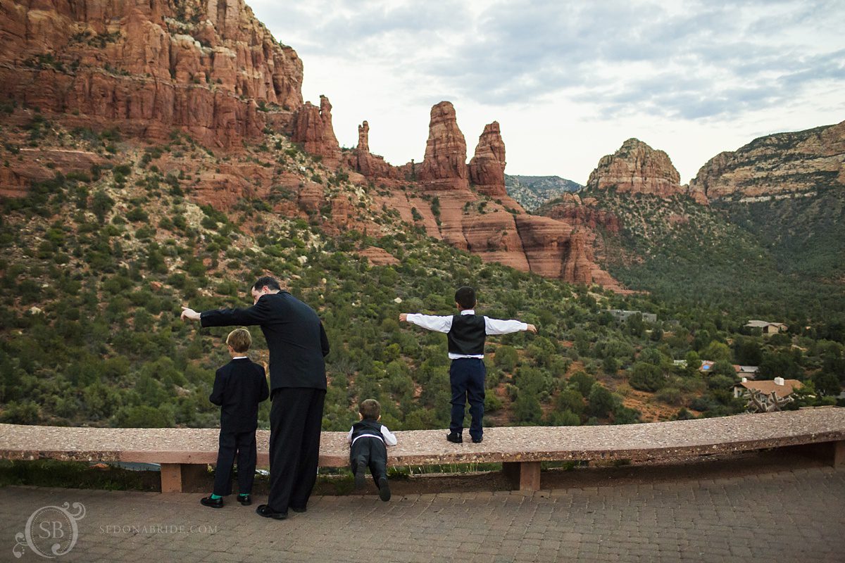 Sedona chapel wedding ~ Anita and Armand's wedding in Sedona - Kids and Dad play in the last moment of light after the Sedona wedding ceremony.