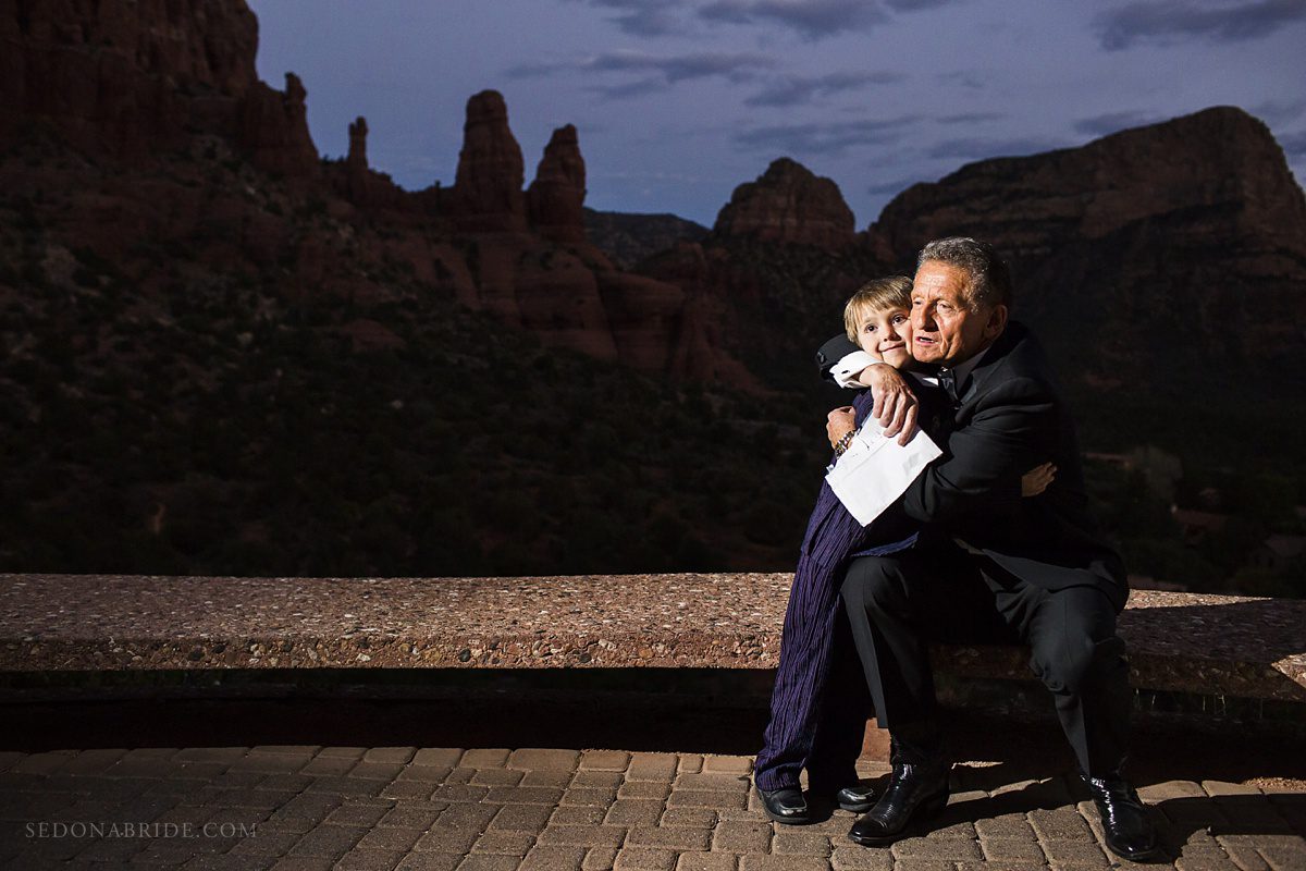 Sedona chapel wedding ~ Anita and Armand's wedding in Sedona - Armand shows his grandfatherly love to a grandchild.