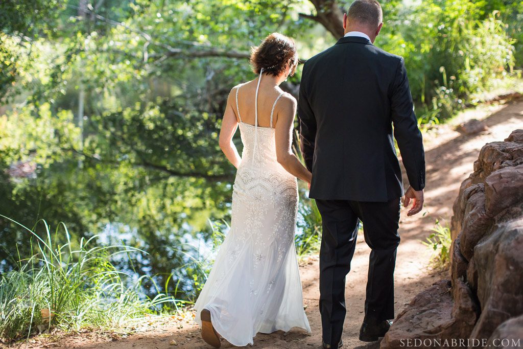 Stacy and George stroll along the creekside in Oak Creek Canyon, Sedona