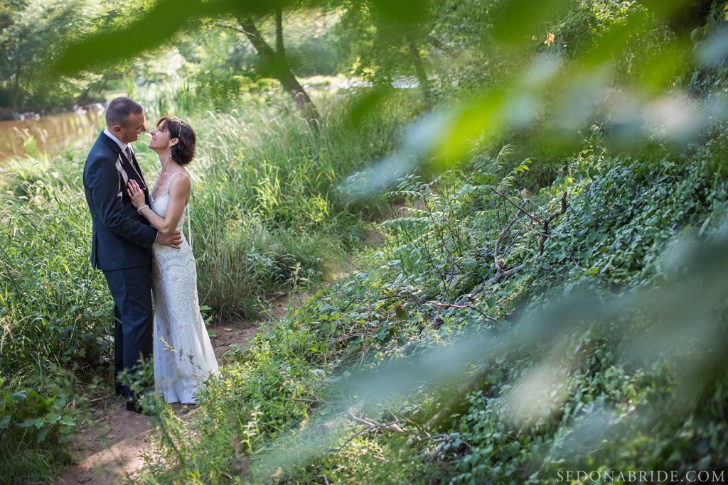 An intimate Sedona elopement about to take place, leaving from the L'Auberge de Sedona property in Oak Creek Canyon, Sedona, Arizona.