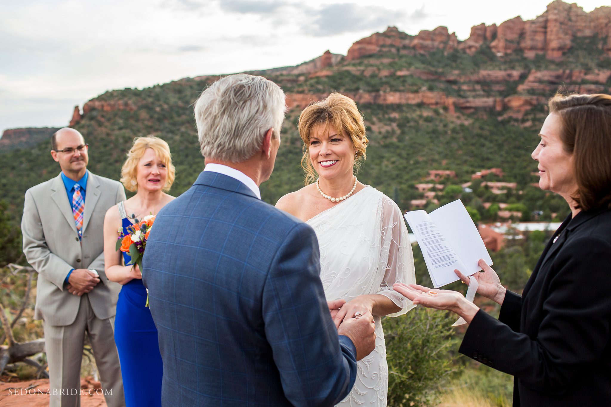 bride and groom exchanging rings during their elopement at Enchantment Resort