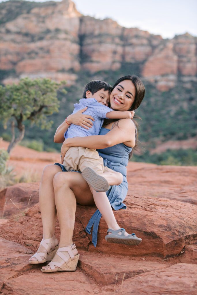 Mom hugs her son during her family photography session in Sedona.